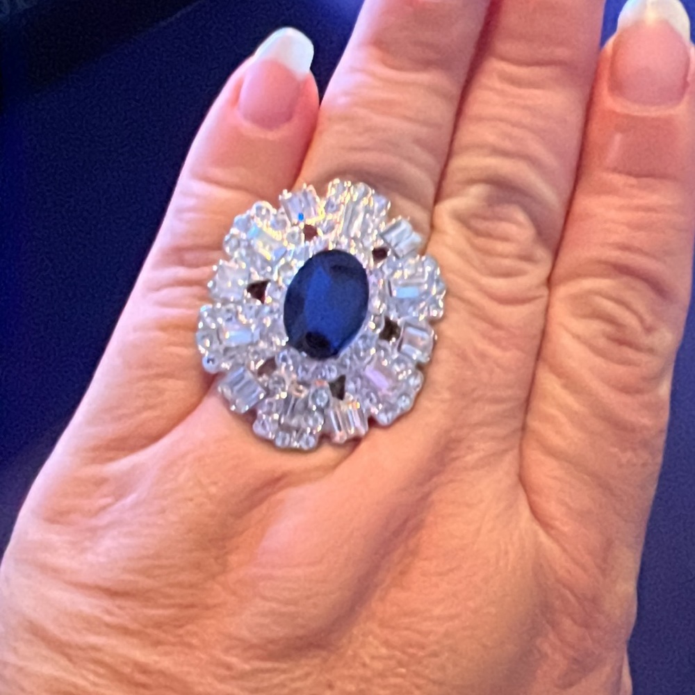 Adjustable fantasy ring with a blue stone